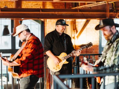 Local musicians performing live music inside Founders Food Hall in Charlottetown Prince Edward Island