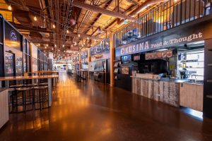 Interior of Founders Food Hall in Charlottetown with local food vendors and seating area for grab and go dinner options
